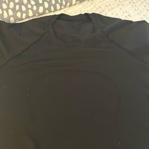 Gently used black Lululemon athletic short sleeve top